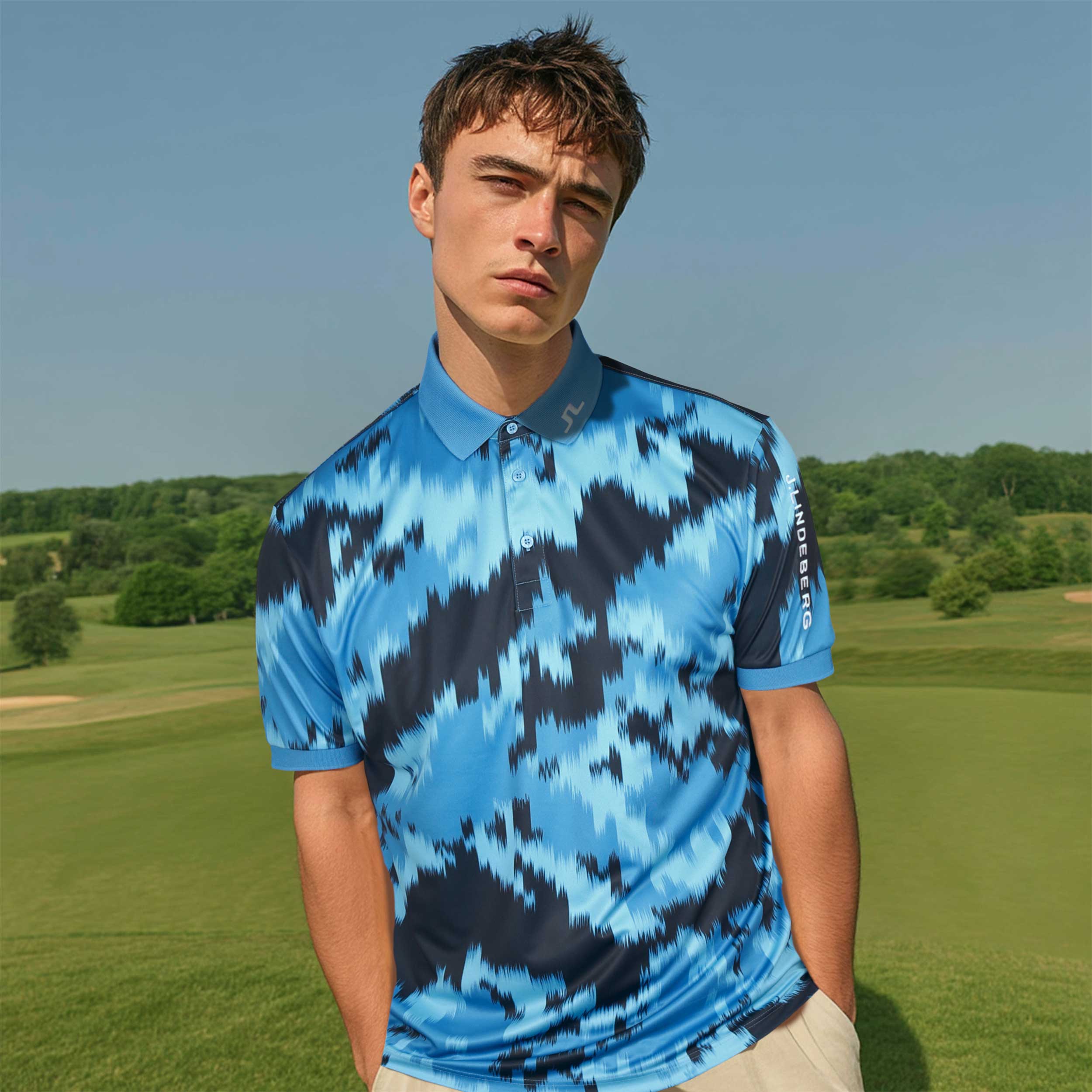 J.Lindeberg Tour Tech Print Polo Shirt in Warp Sonic Blue J.Lindeberg Tour Tech Print Polo Shirt in Warp Sonic Blue