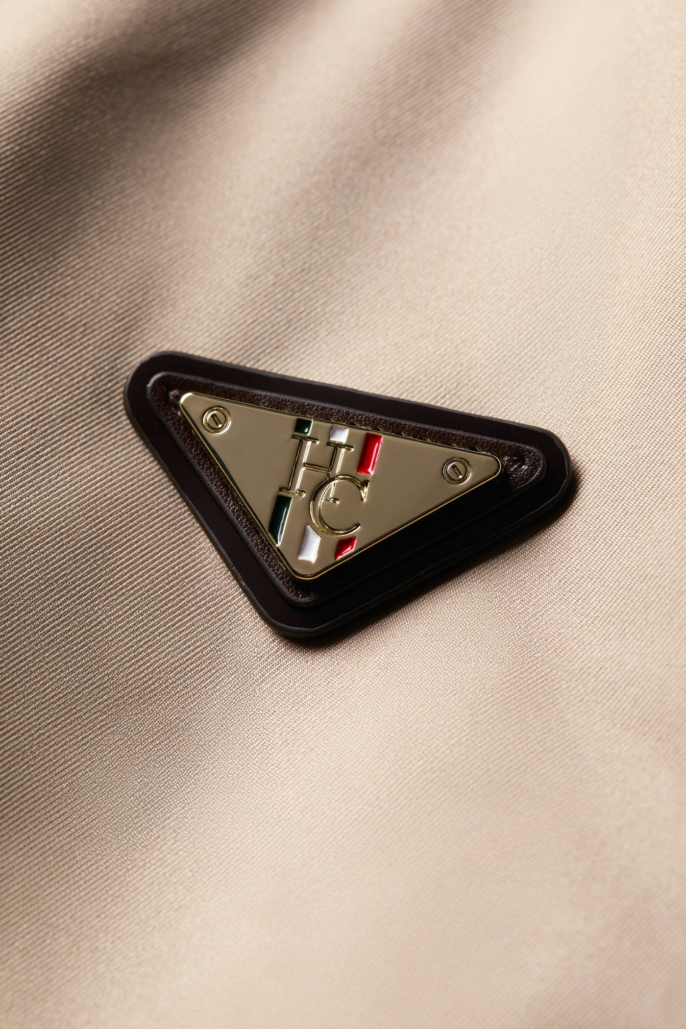 Holland Cooper Rosedale Waterproof Parka in Stone Logo Badge