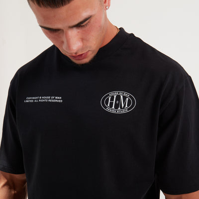 House Of Man Oval HoM T Shirt in Black Logo