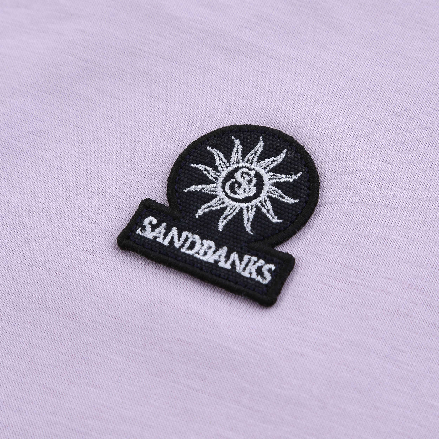 Sandbanks Badge Logo T Shirt in Lilac Logo