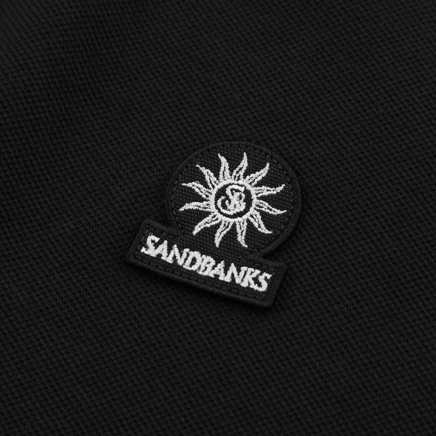 Sandbanks Badge Logo Tipped Polo Shirt in Black Logo