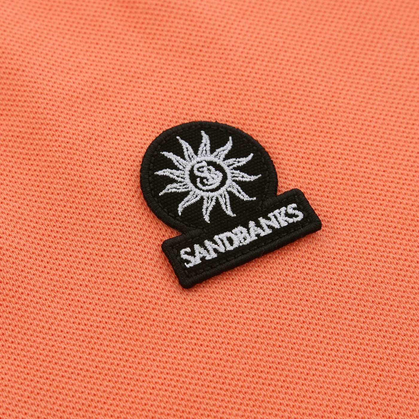 Sandbanks Badge Logo Tipped Polo Shirt in Coral Logo