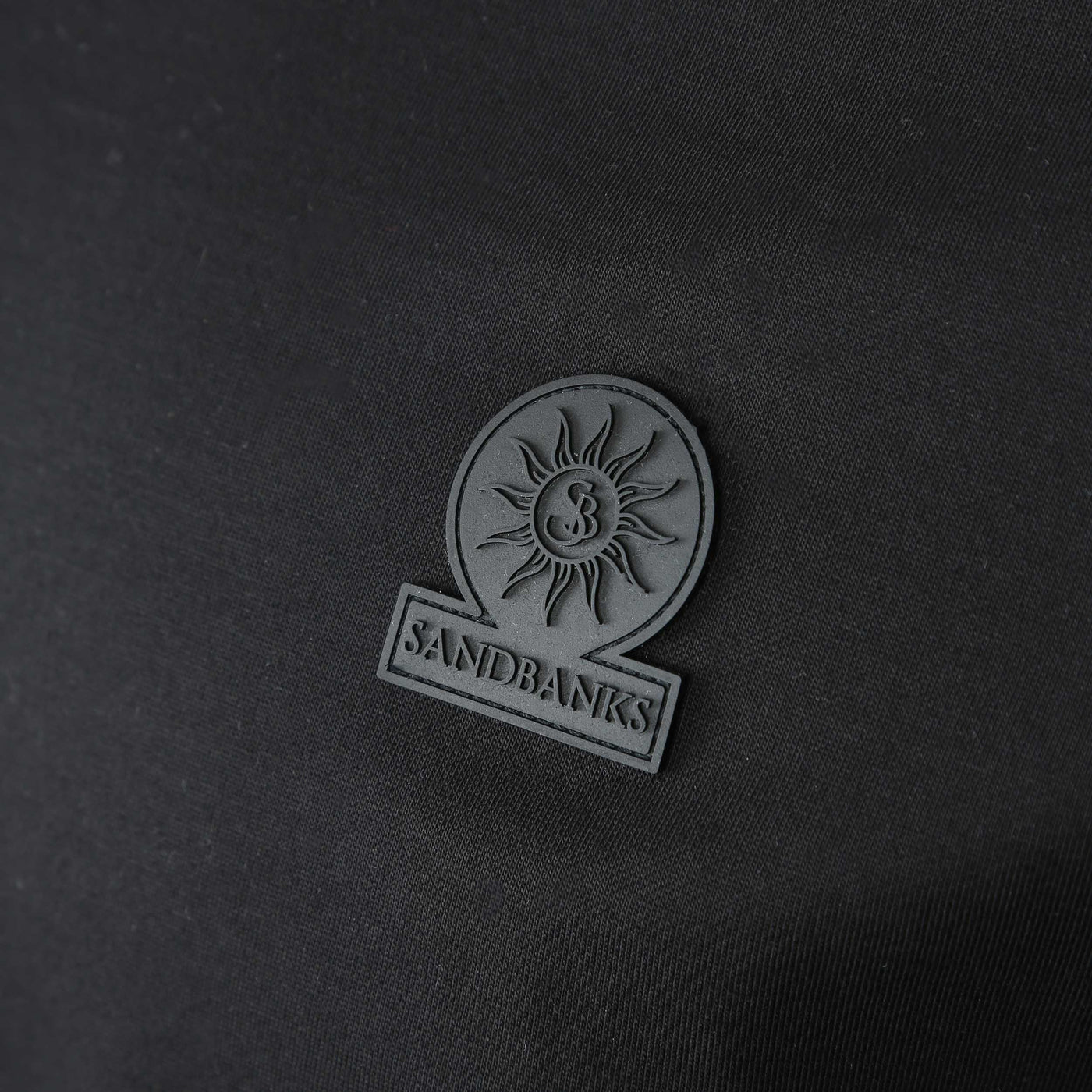 Sandbanks Rubber Badge Logo T Shirt in Black Logo